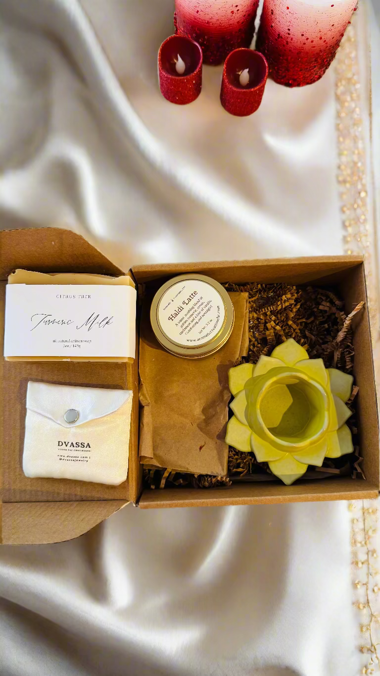 Gift box with candles, soap, and a candle holder and dvassa jewelry