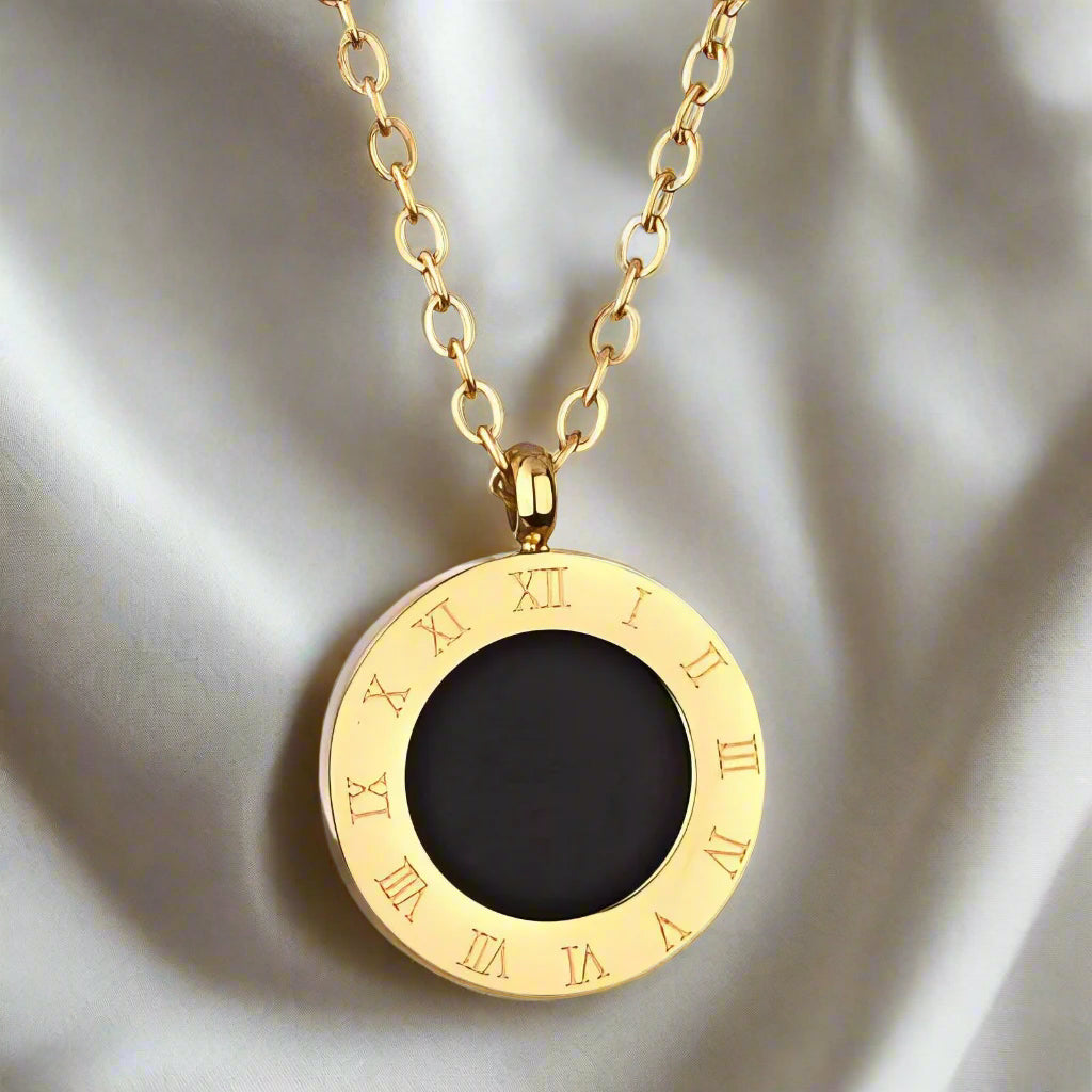 Elegant gold chain necklace with minimalist design of roman numerals