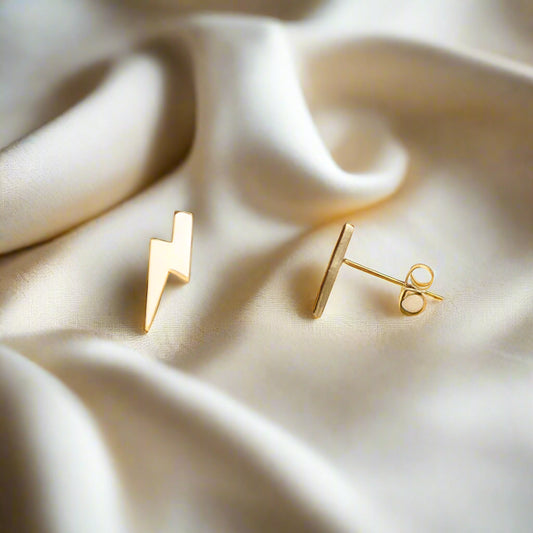 Gold lightning bolt earrings as sustainable jewelry 
